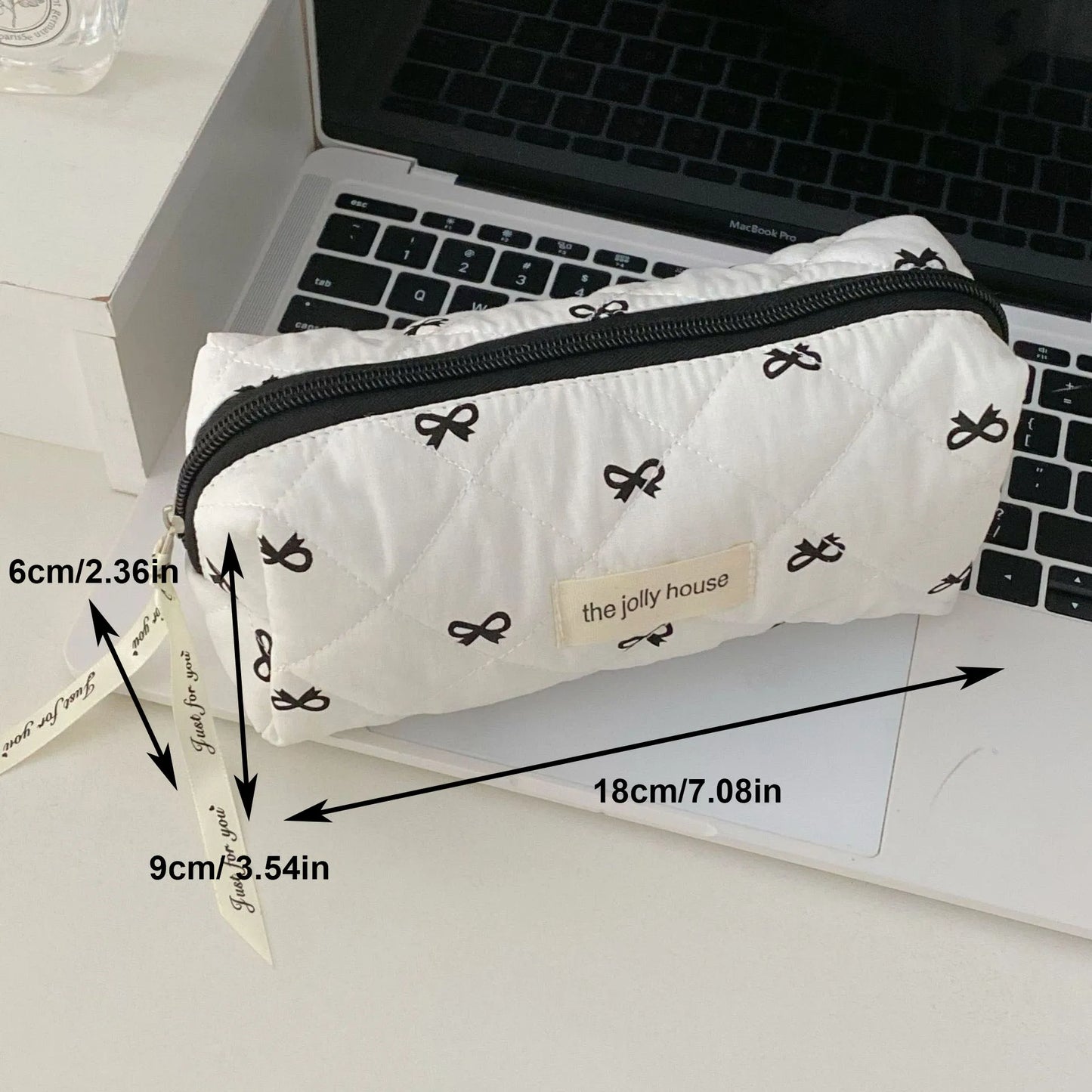 Black-white bow pouch travel bags