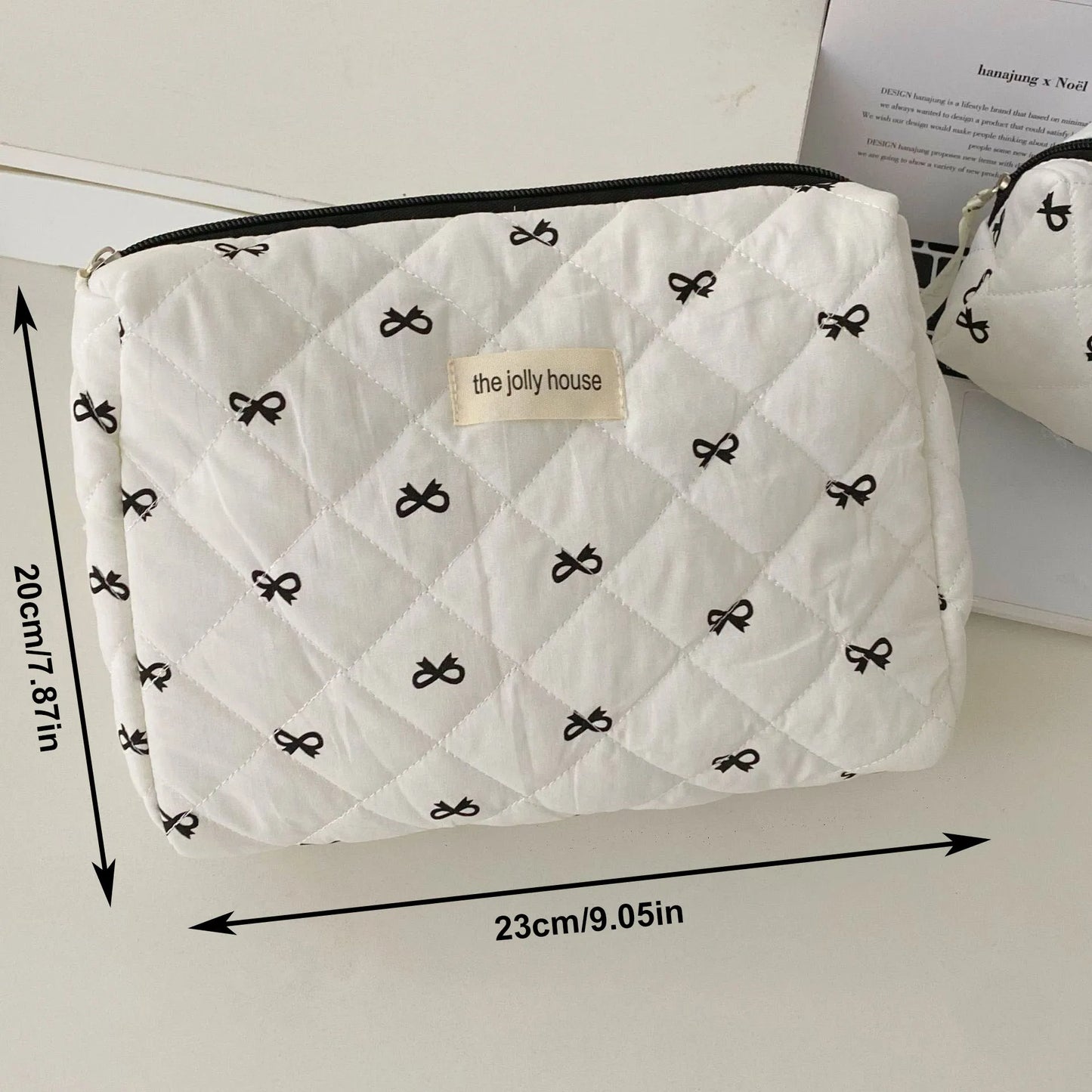 Black-white bow pouch travel bags