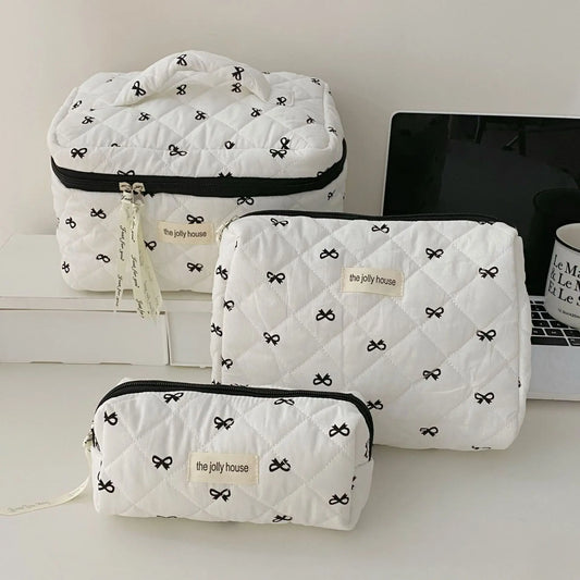 Black-white bow pouch travel bags