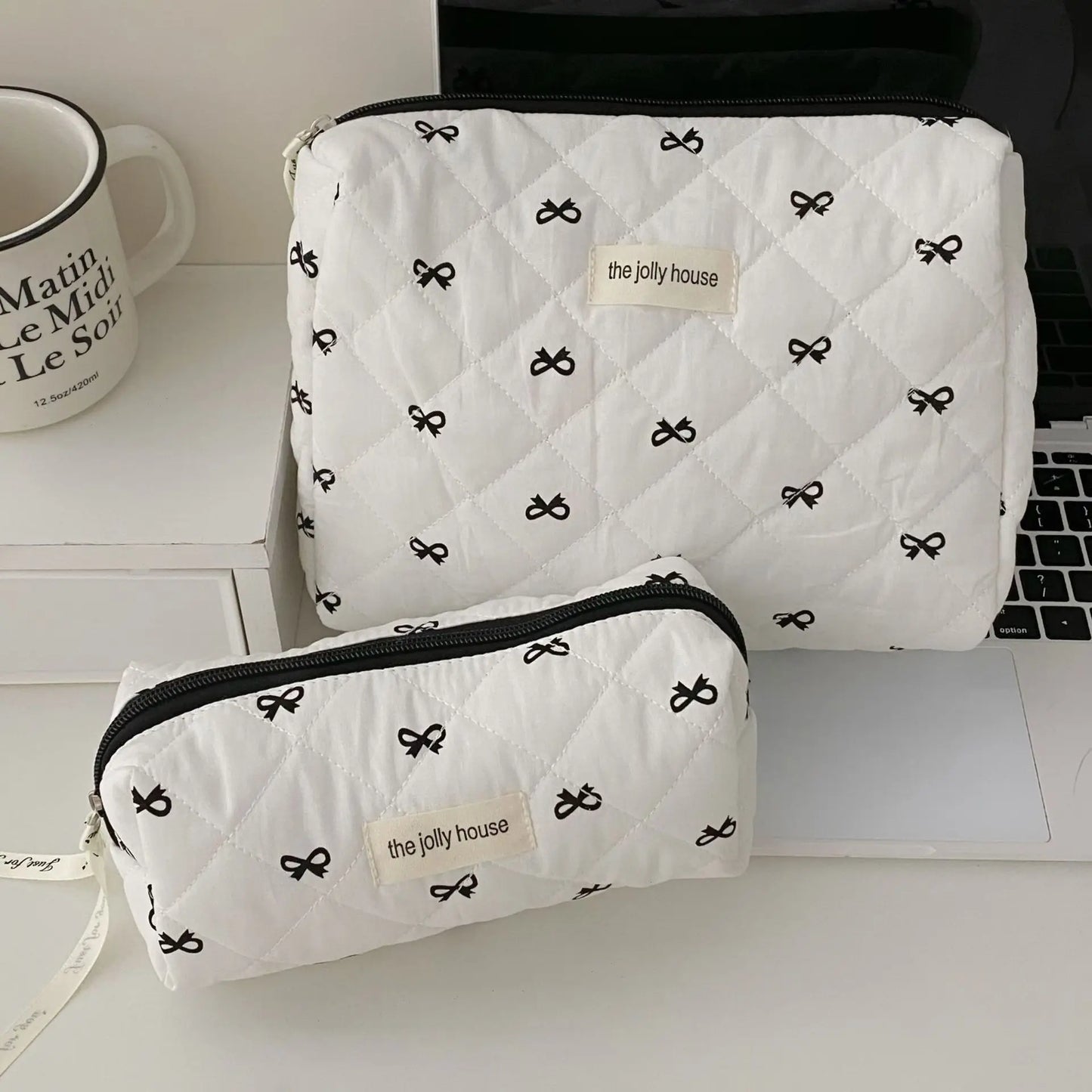 Black-white bow pouch travel bags